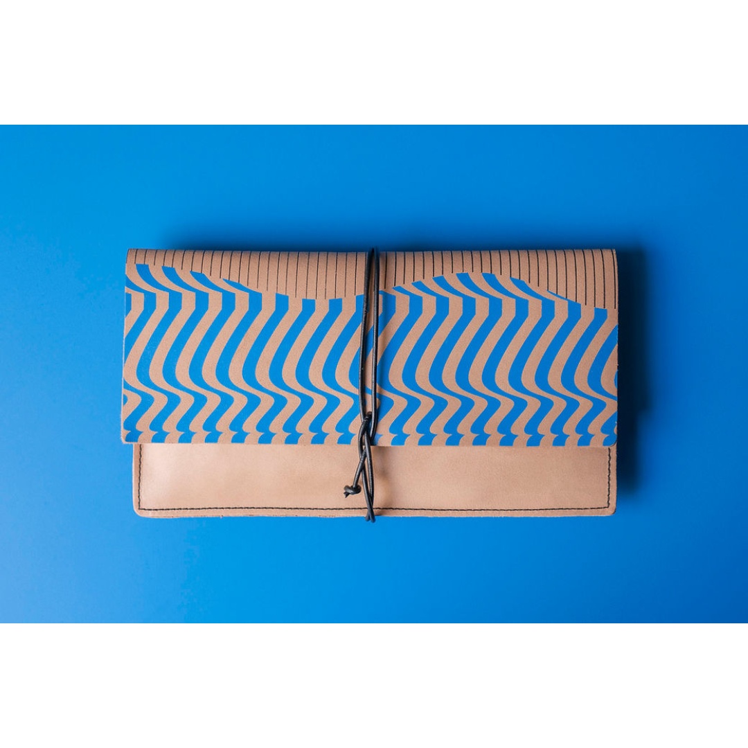 Avant-Garde Clutch/Purse made of Cretan goat leather and leather cord. Silkscreen printed.