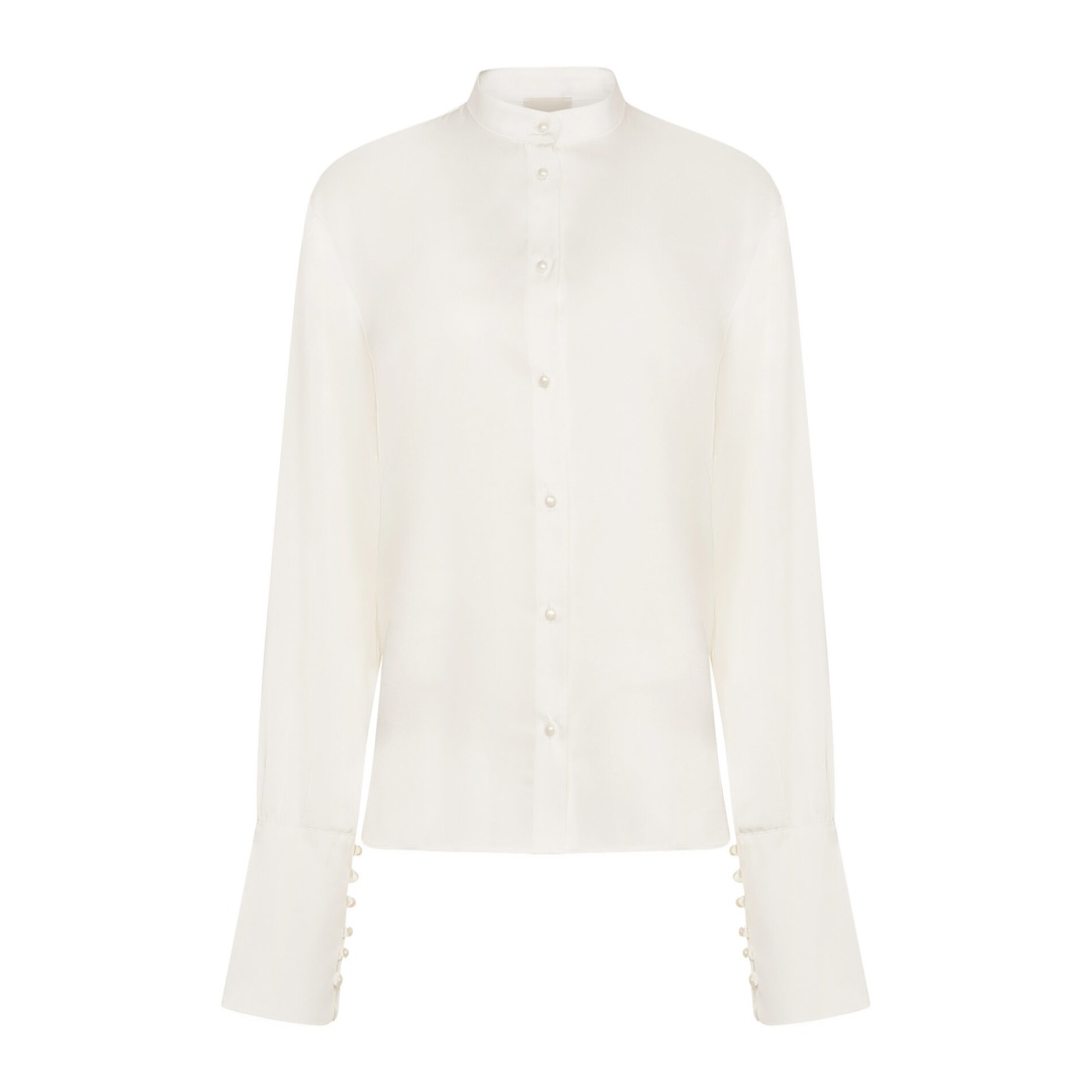 JANINE WHITE Our shirts is your fav item all year long and this spring we made it more airy and silky to match your spring mood! Janine is our new silky shirt and a must-have spring item. With pearl buttons